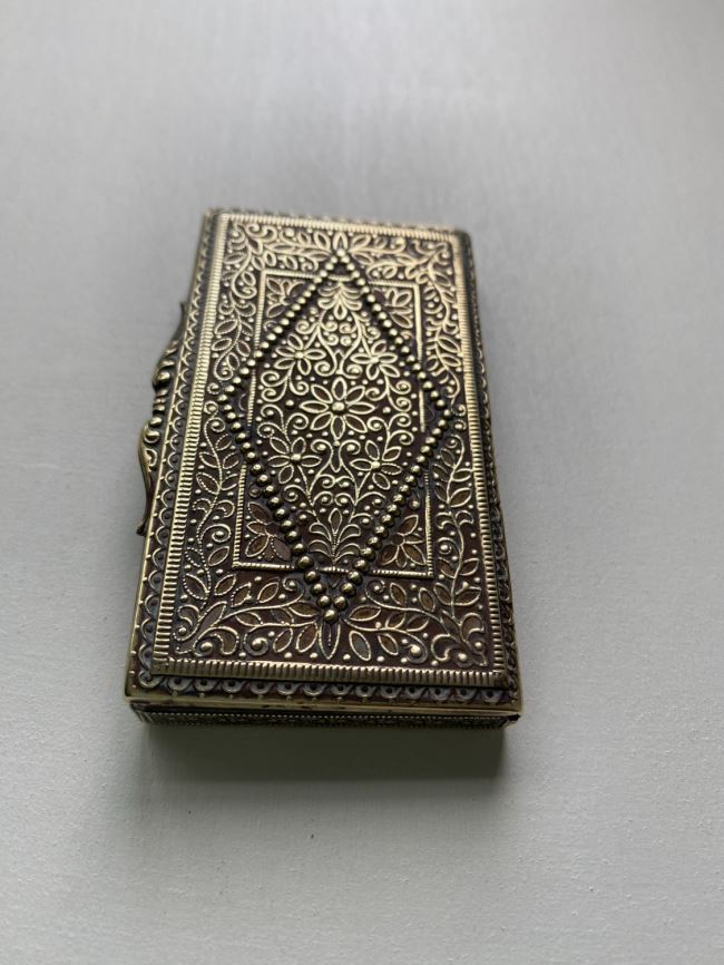 Anglo-Indian cigarette box with intricate raised design Anglo-Indian cigarette box with intricate raised design