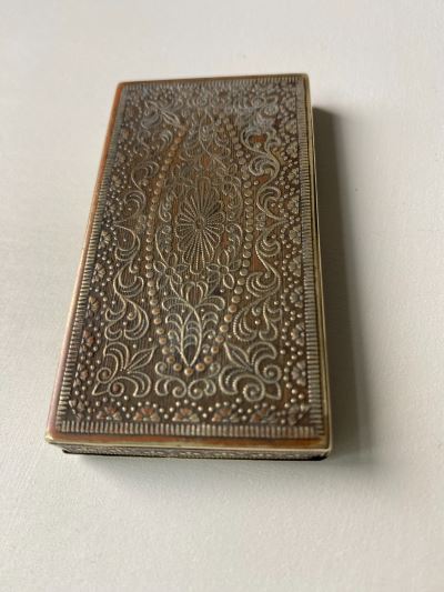 Anglo-Indian cigarette box with intricate raised design 